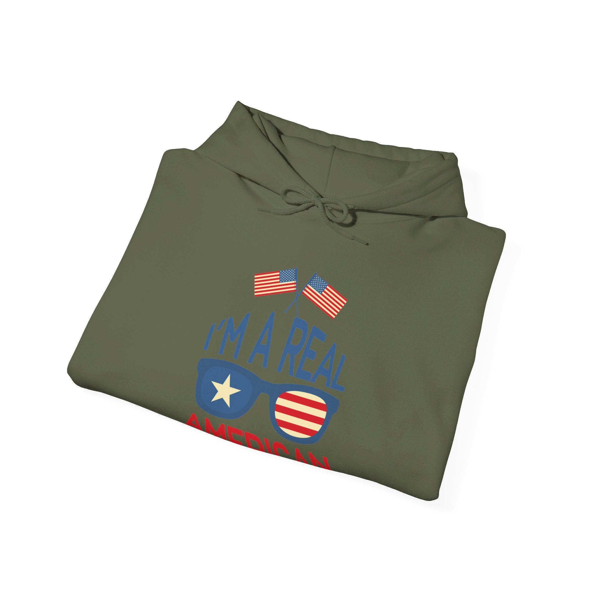 Unisex Heavy Blend Hooded Sweatshirt featuring 'A Real American' design, showcasing a cozy fit with a kangaroo pocket and stylish drawstring.