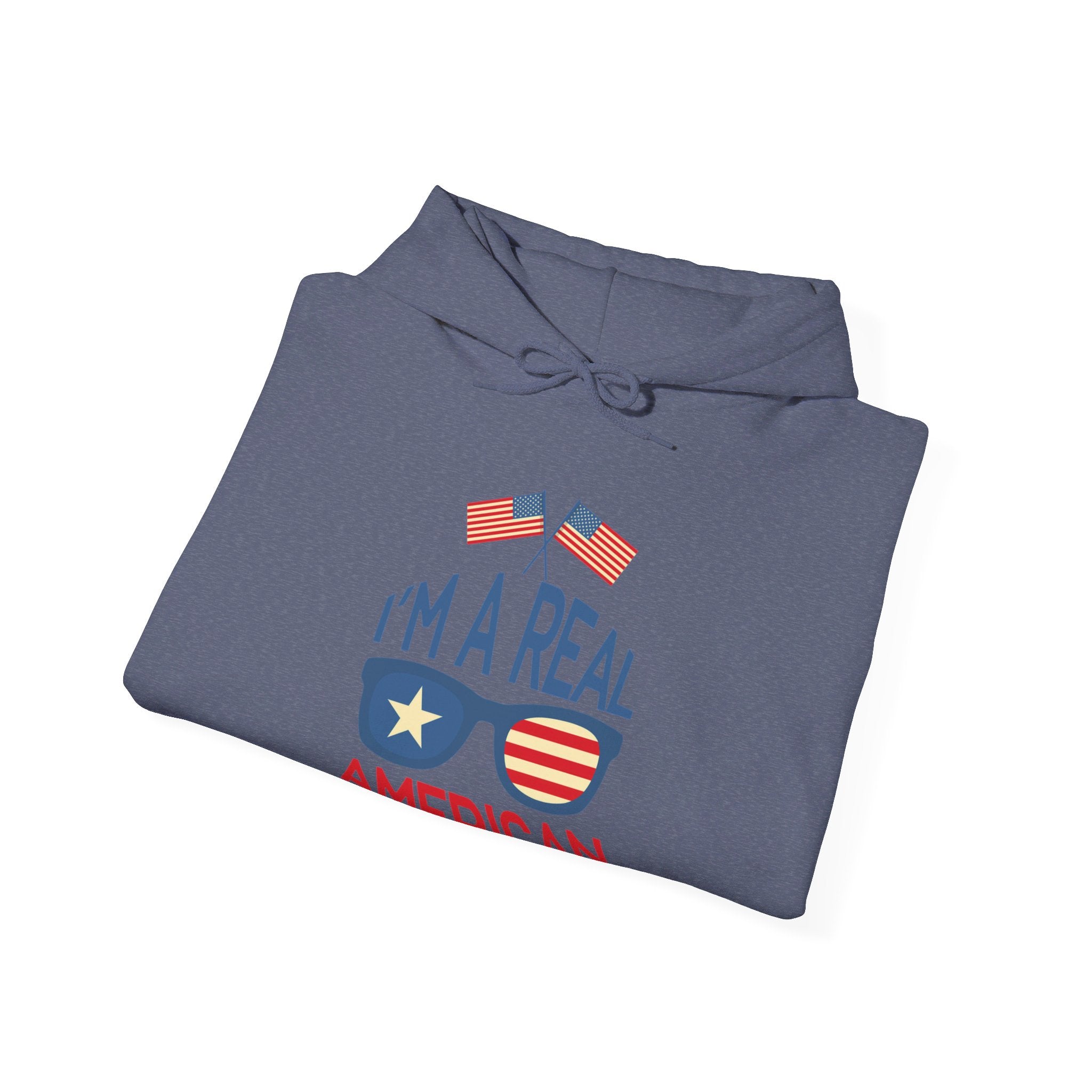 Unisex Heavy Blend Hooded Sweatshirt featuring 'A Real American' design, showcasing a cozy fit with a kangaroo pocket and stylish drawstring.