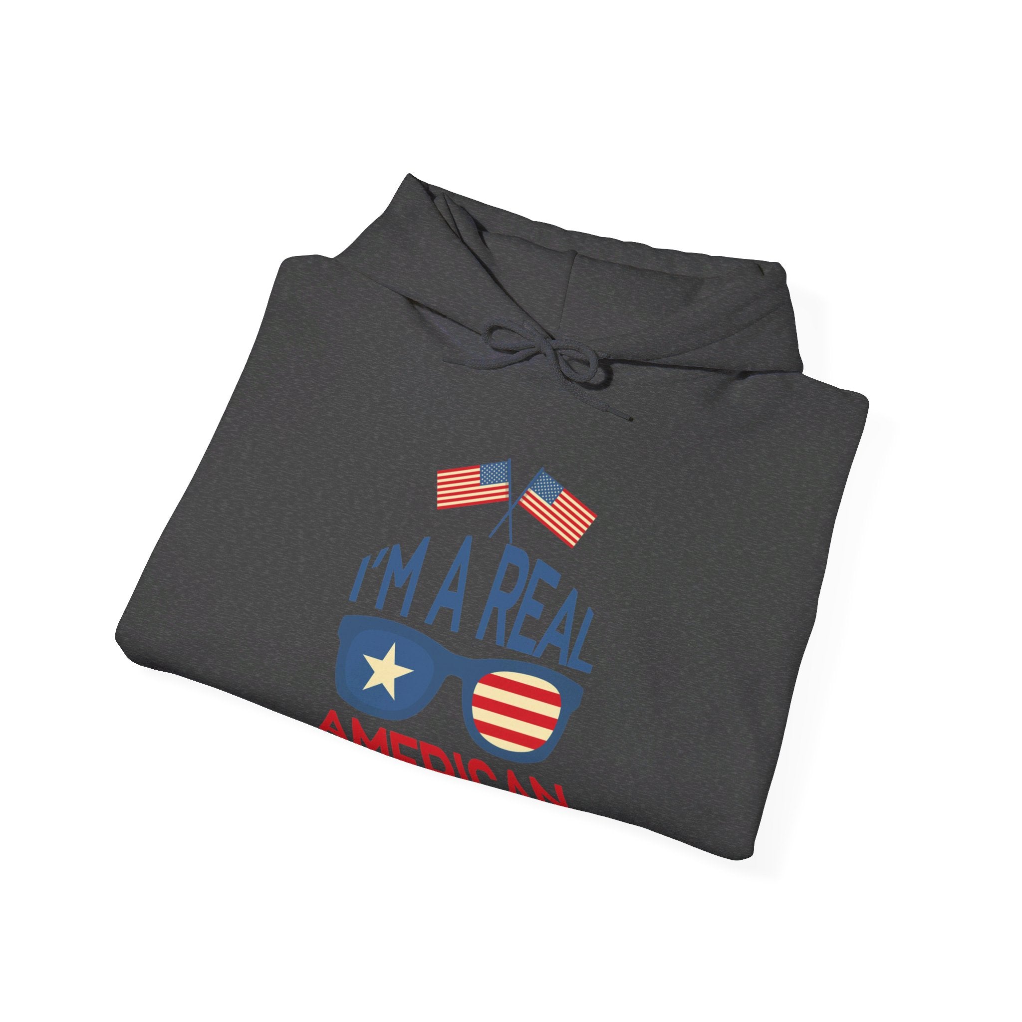 Unisex Heavy Blend Hooded Sweatshirt featuring 'A Real American' design, showcasing a cozy fit with a kangaroo pocket and stylish drawstring.
