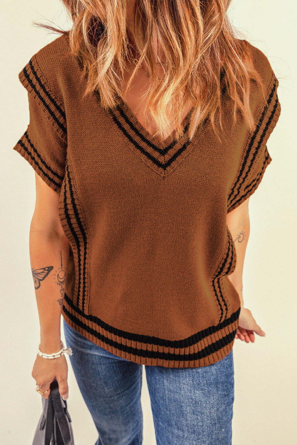 A stylish V Neck Contrast Stripes Trims Short Sleeve Sweater featuring a chic v-neckline, contrast stripe details, and soft knitted fabric.