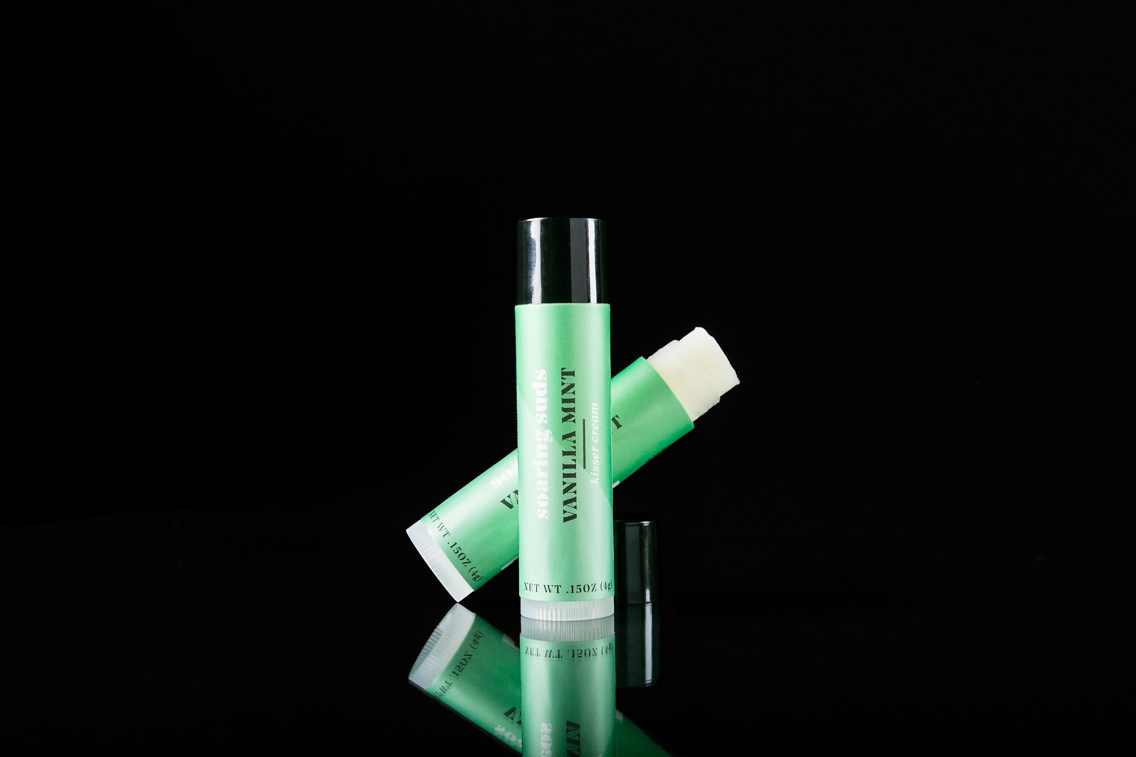 Vanilla Mint Kisser Cream lip balm tube with a refreshing vanilla and mint scent, showcasing its natural ingredients.