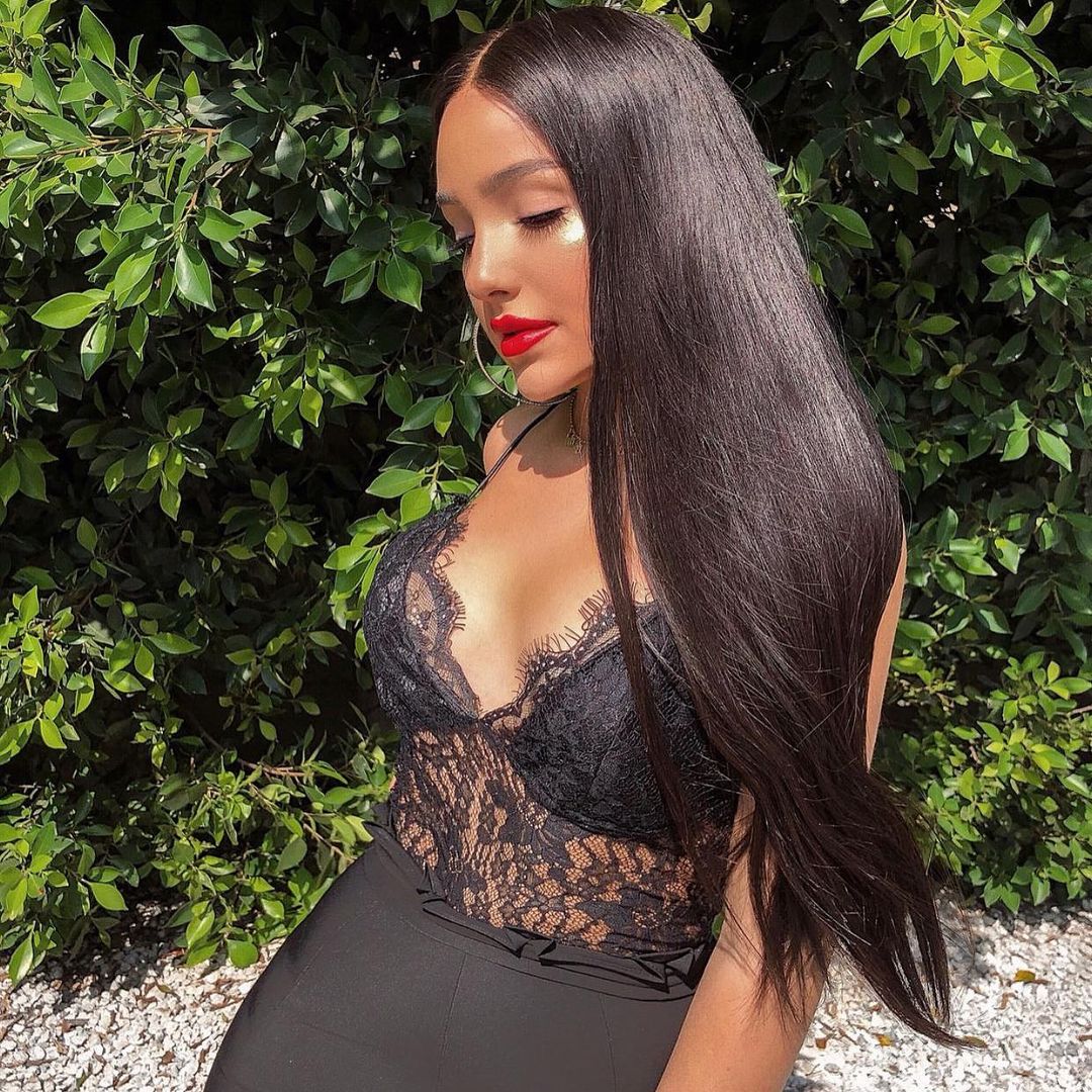 Virgin Remy Hair Straight Bundles in natural black color, showcasing silky texture and double machine weft construction.