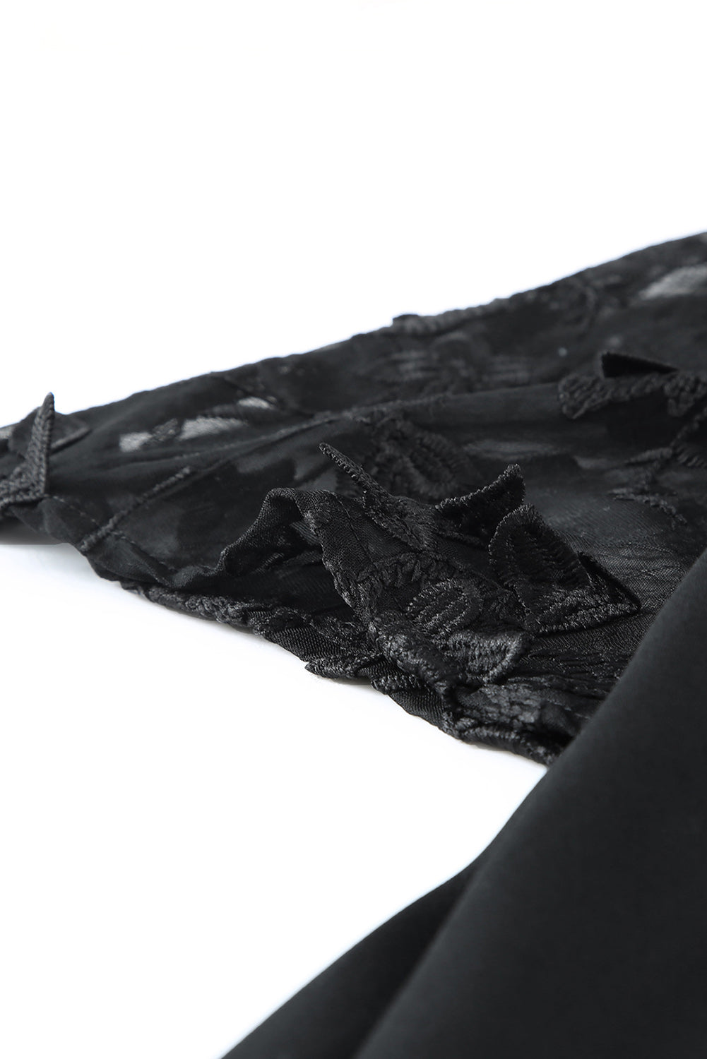 A beautiful white floral mesh lace crochet kimono with an open front, showcasing delicate lace details and a loose fit, perfect for summer wear.