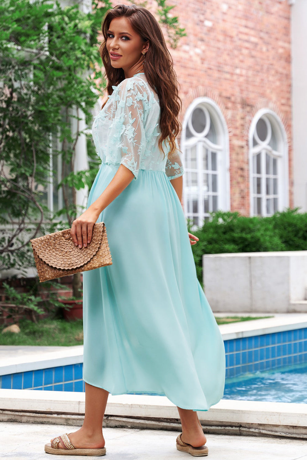 A beautiful white floral mesh lace crochet kimono with an open front, showcasing delicate lace details and a loose fit, perfect for summer wear.