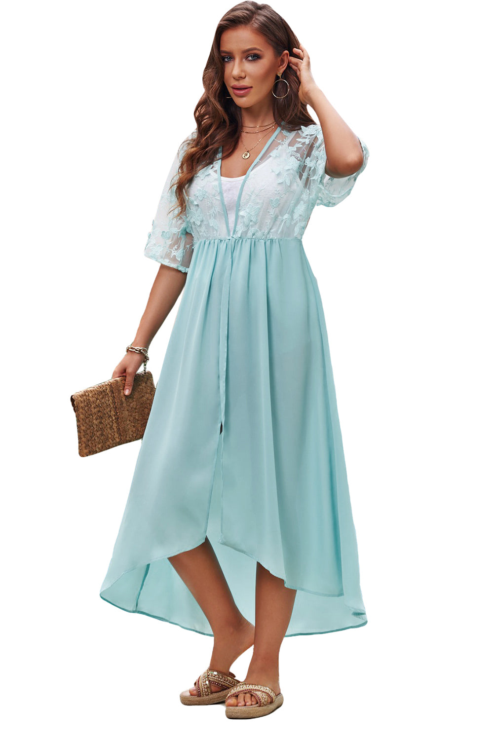 A beautiful white floral mesh lace crochet kimono with an open front, showcasing delicate lace details and a loose fit, perfect for summer wear.