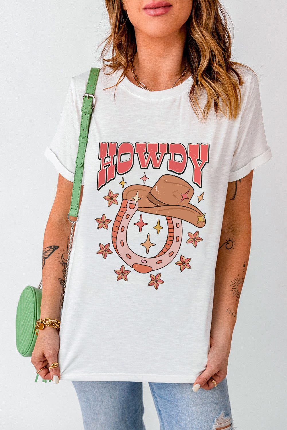 White HOWDY Western Hat T Shirt featuring horseshoe and star print design, perfect for casual western style.