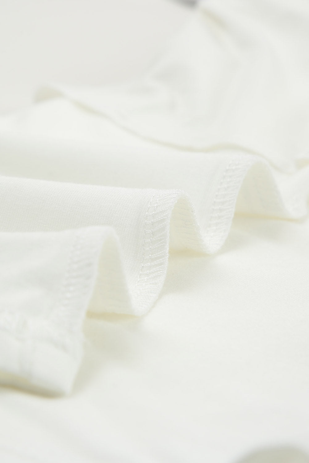 White lace-up hollow-out neck solid tank top showcasing a stylish design with a deep U-neck and sleeveless cut.