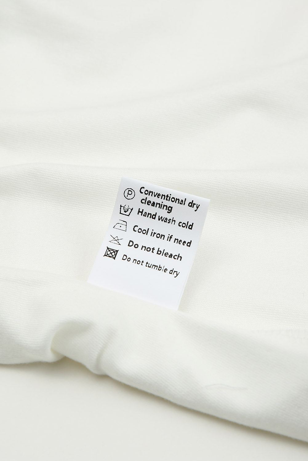 White lace-up hollow-out neck solid tank top showcasing a stylish design with a deep U-neck and sleeveless cut.