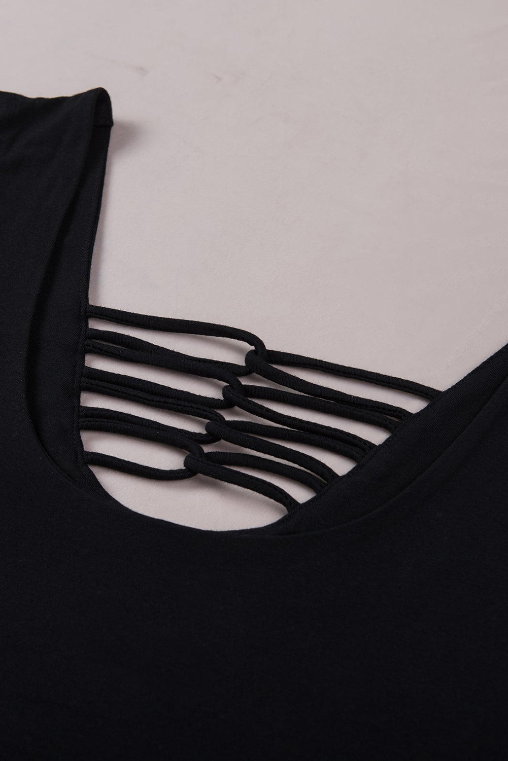 White lace-up hollow-out neck solid tank top showcasing a stylish design with a deep U-neck and sleeveless cut.