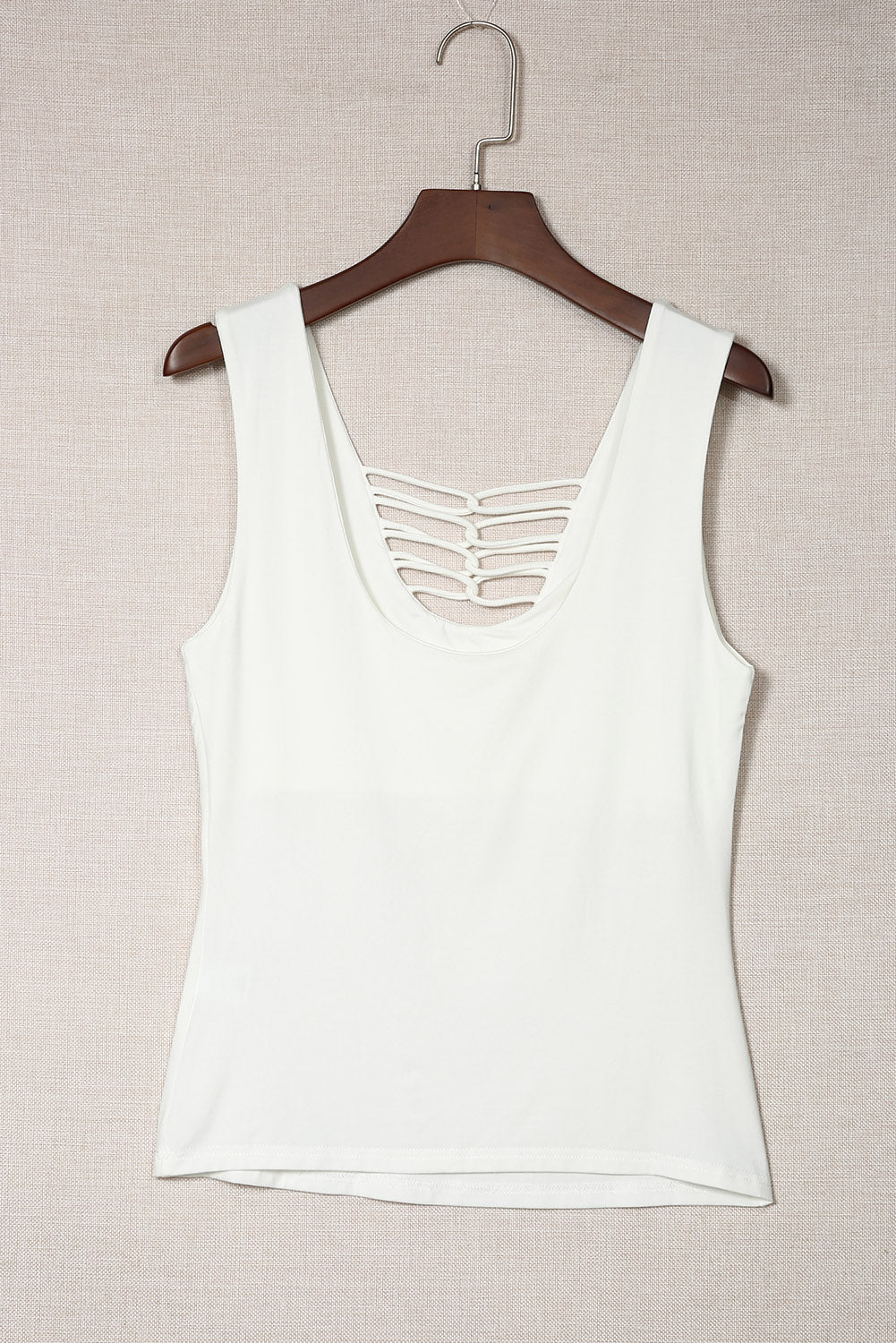 White lace-up hollow-out neck solid tank top showcasing a stylish design with a deep U-neck and sleeveless cut.