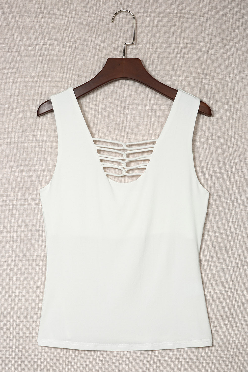 White lace-up hollow-out neck solid tank top showcasing a stylish design with a deep U-neck and sleeveless cut.