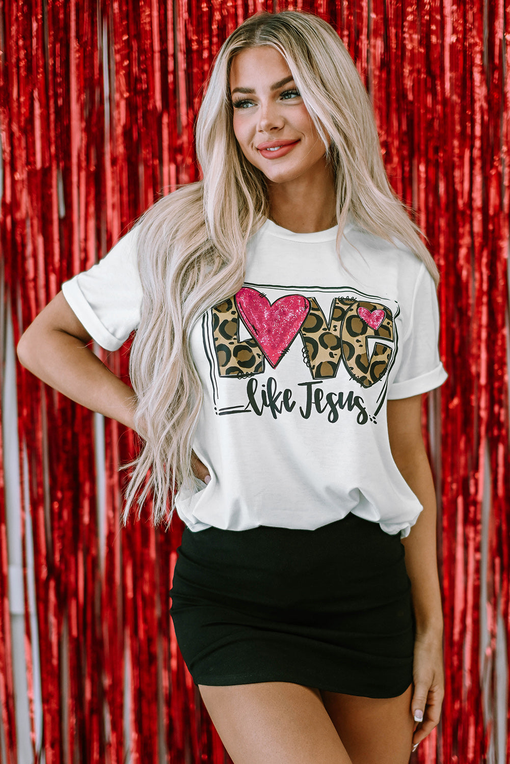 White crew neck tee featuring the graphic 'LOVE Like Jesus' in bold letters, perfect for casual wear.