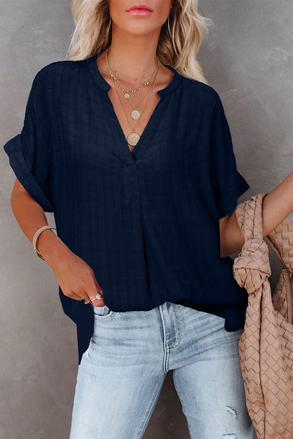 A stylish white plaid print loose V neck short sleeve shirt with slits, showcasing its trendy design and comfortable fit.