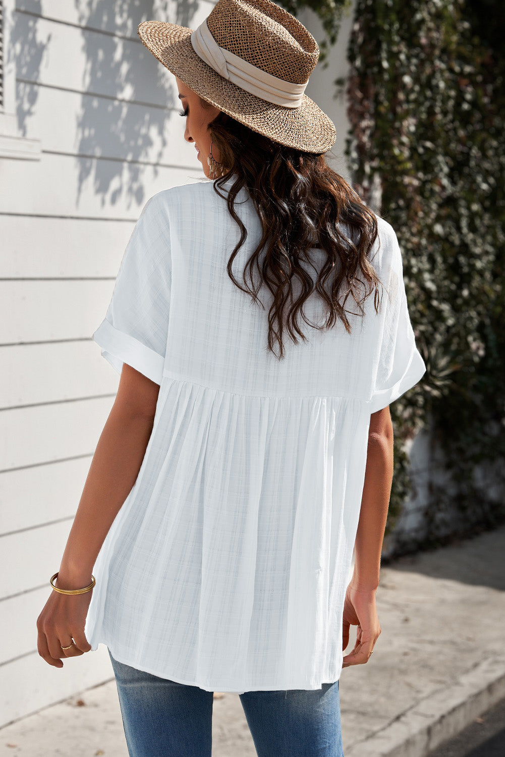 A stylish white plaid print loose V neck short sleeve shirt with slits, showcasing its trendy design and comfortable fit.