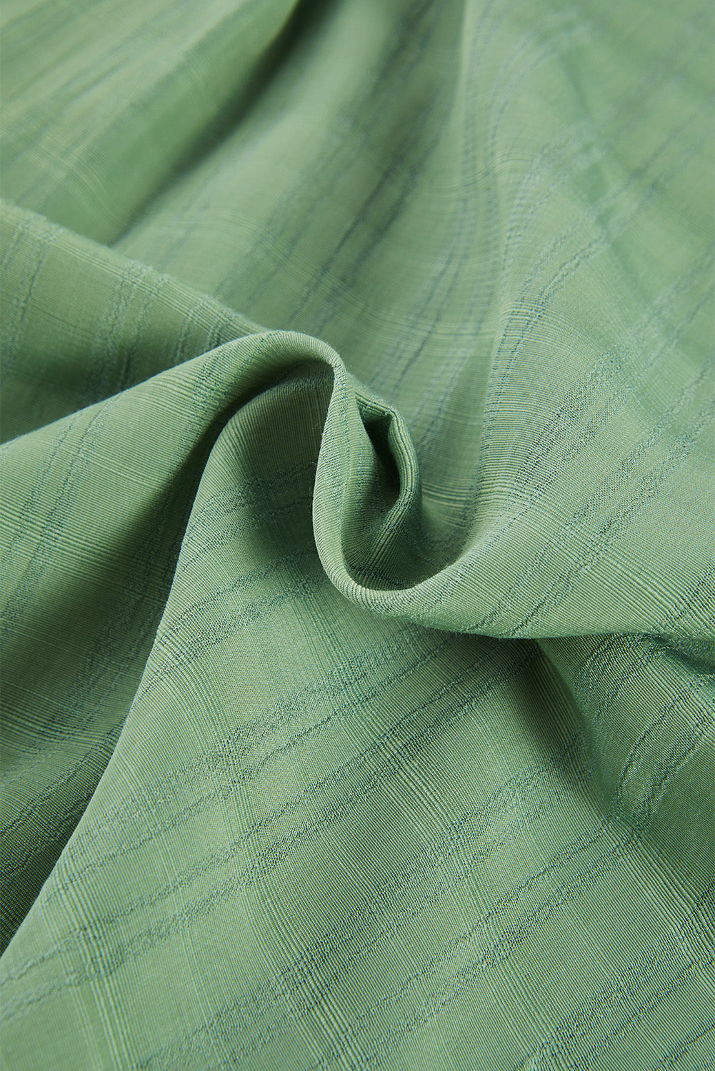 A stylish white plaid print loose V neck short sleeve shirt with slits, showcasing its trendy design and comfortable fit.