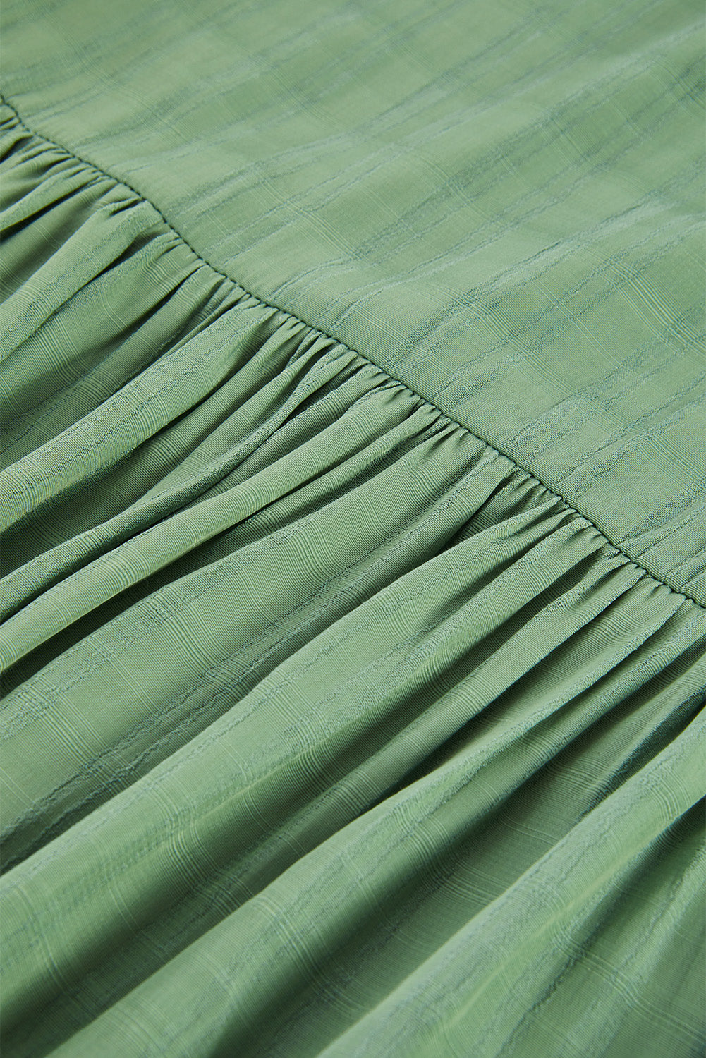 A stylish white plaid print loose V neck short sleeve shirt with slits, showcasing its trendy design and comfortable fit.