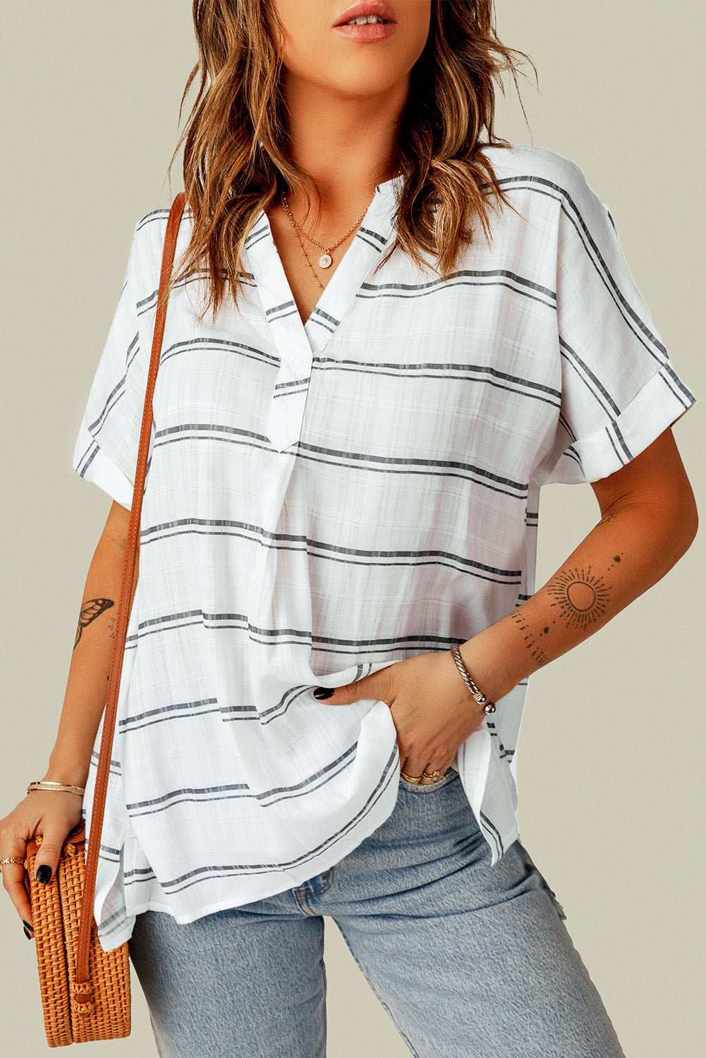 A stylish white plaid print loose V neck short sleeve shirt with slits, showcasing its trendy design and comfortable fit.
