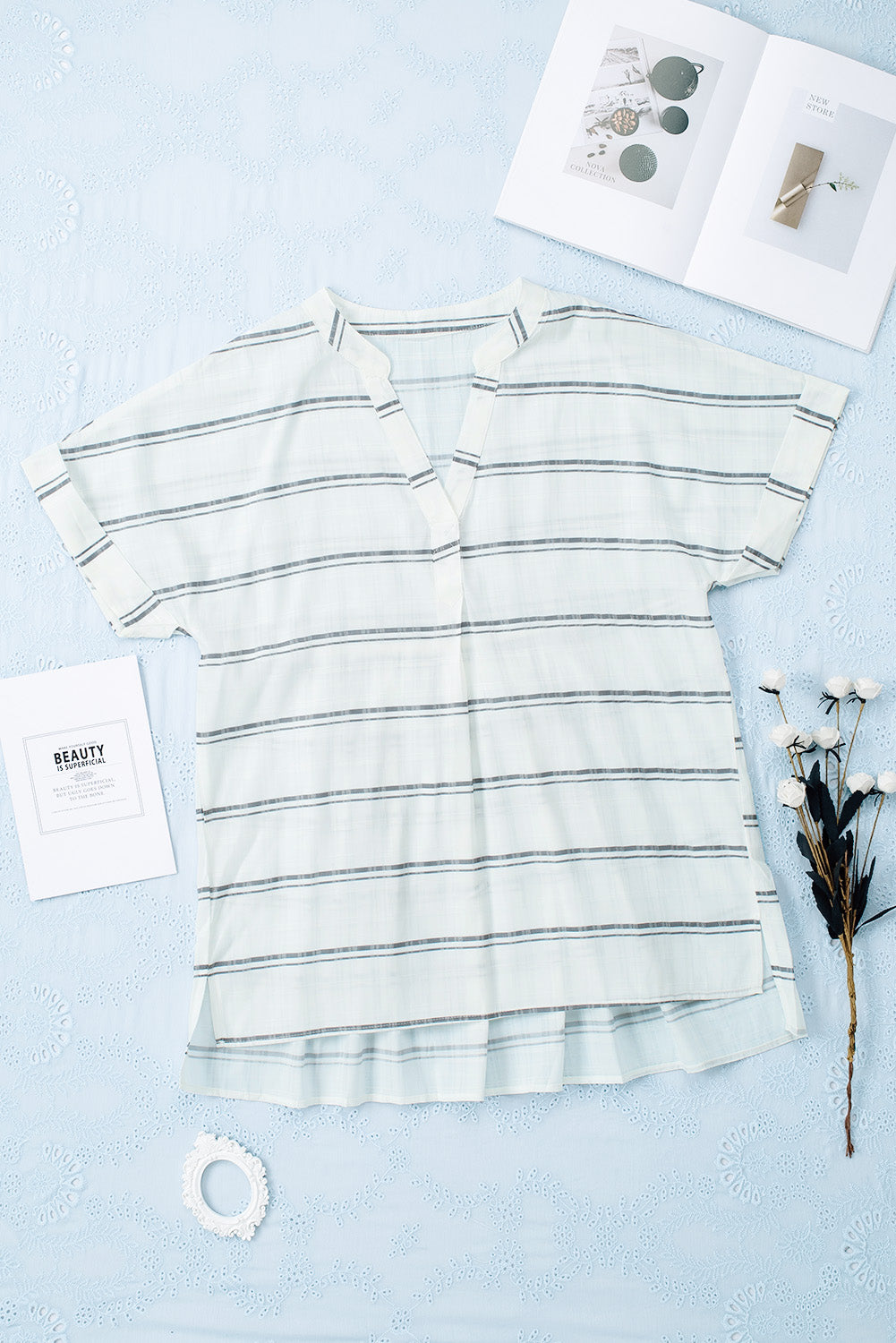 A stylish white plaid print loose V neck short sleeve shirt with slits, showcasing its trendy design and comfortable fit.