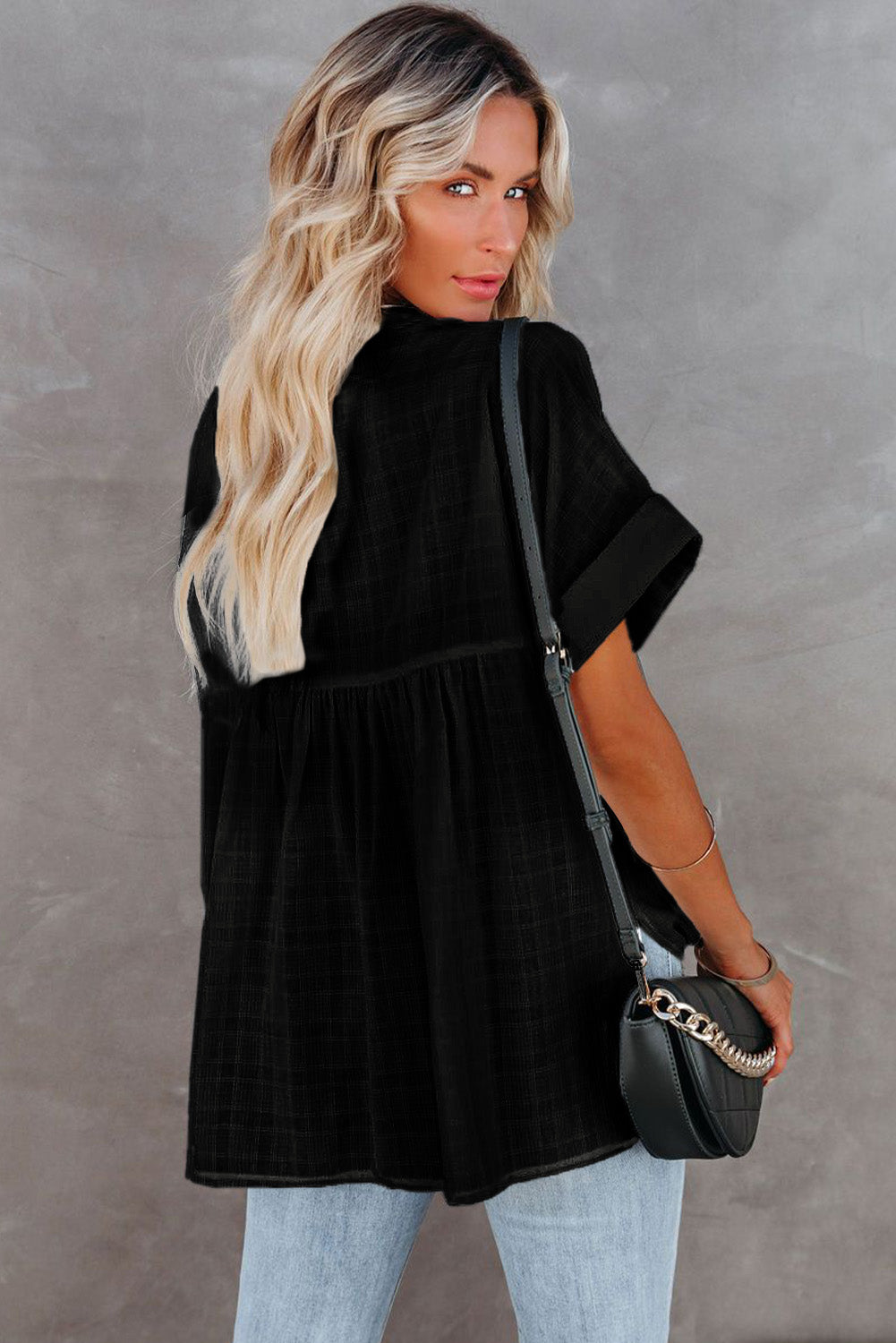 A stylish white plaid print loose V neck short sleeve shirt with slits, showcasing its trendy design and comfortable fit.