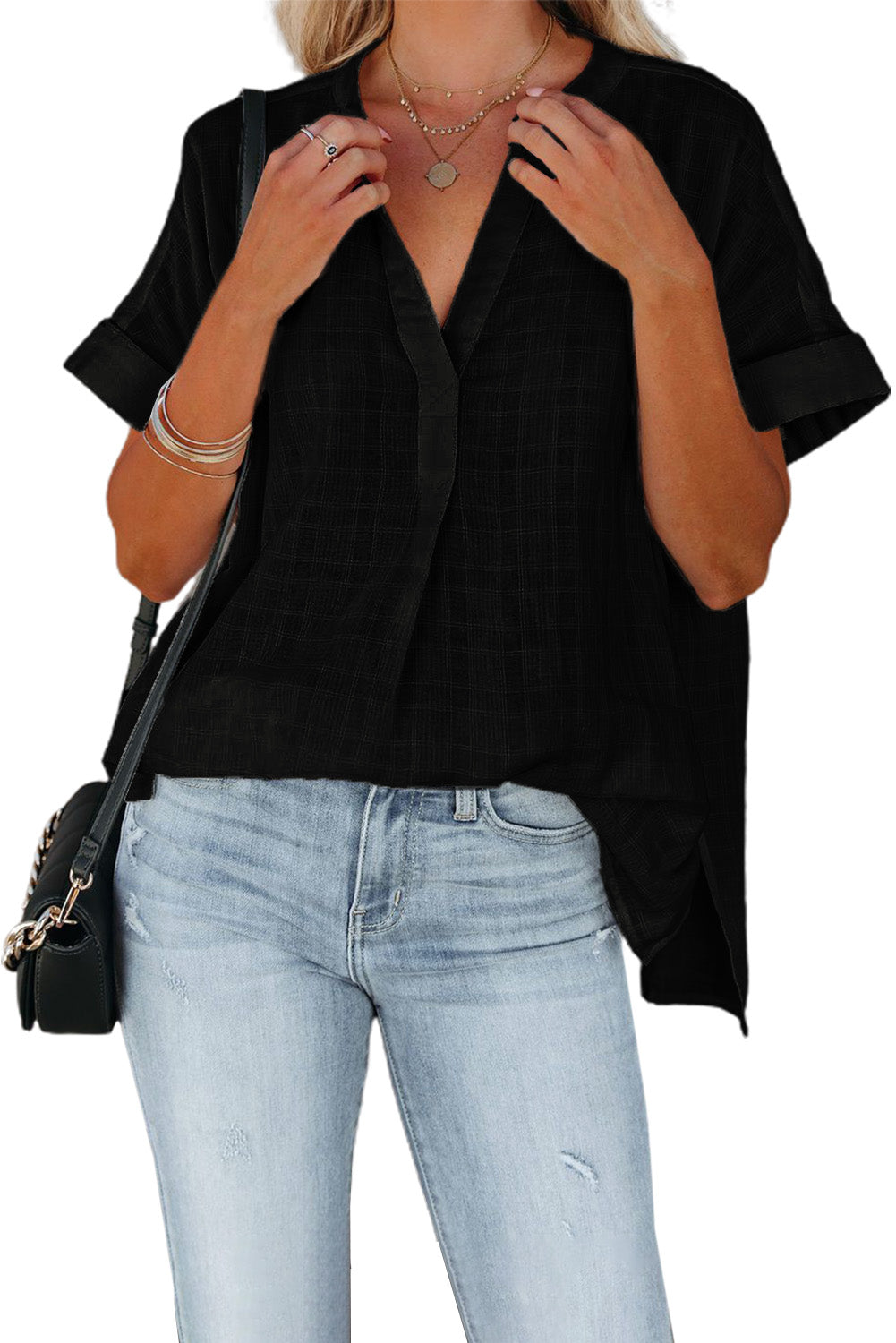 A stylish white plaid print loose V neck short sleeve shirt with slits, showcasing its trendy design and comfortable fit.