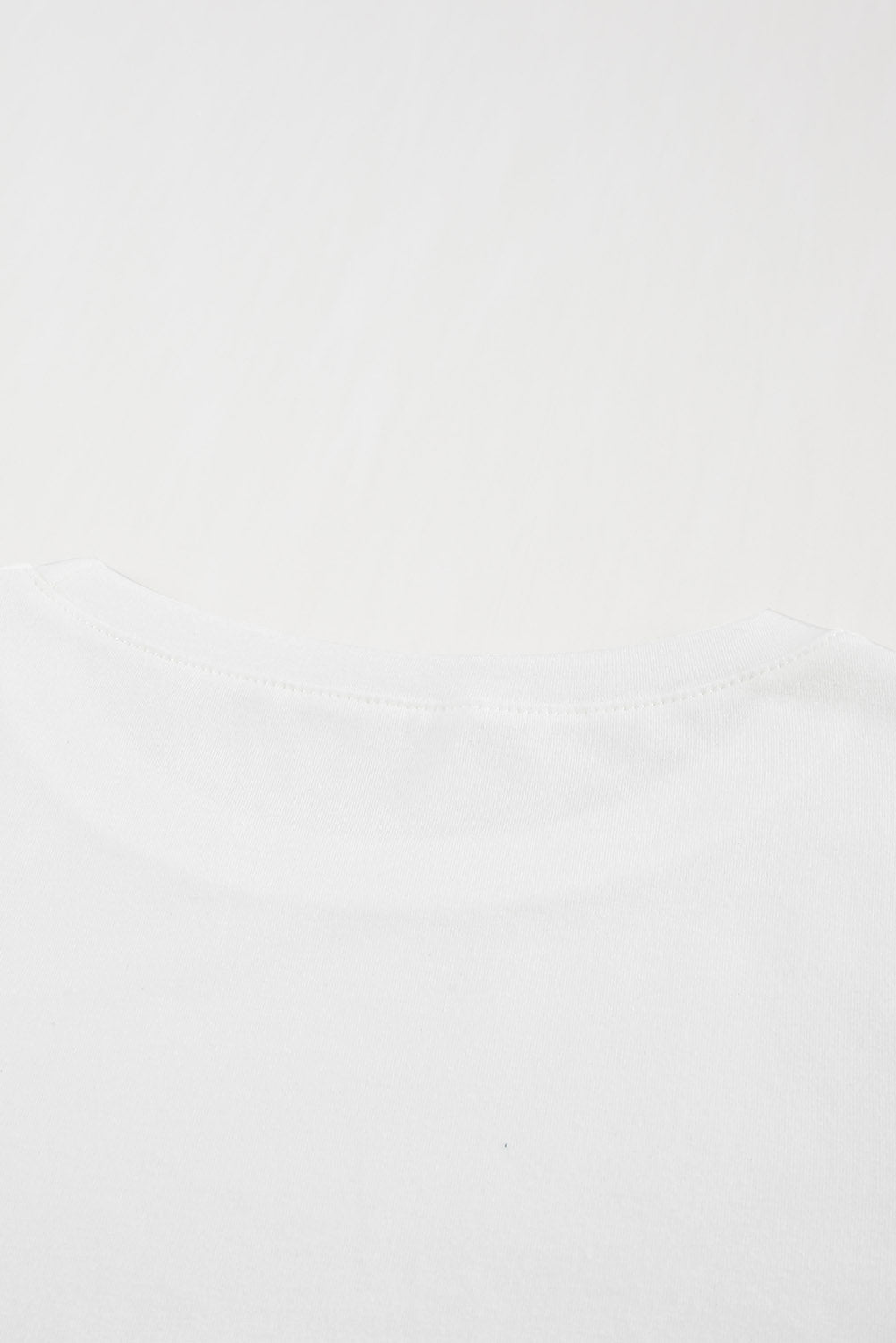 A stylish white short sleeve t-shirt featuring ruffled sleeves, perfect for casual wear.