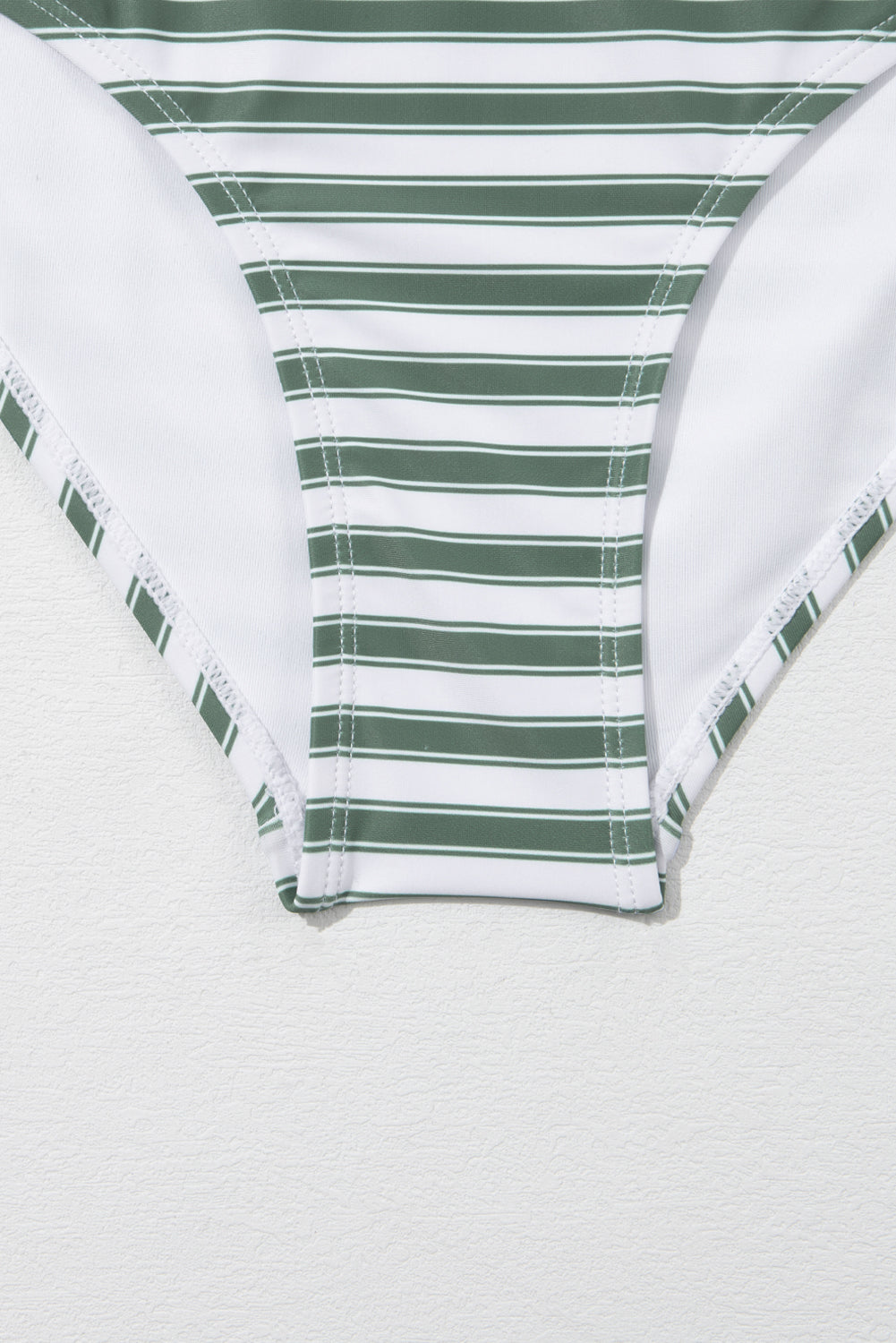 White Stripe Zipped Cut Out Racer Back High Waisted Bikini displayed on a mannequin, showcasing its stylish design and high-waisted fit.