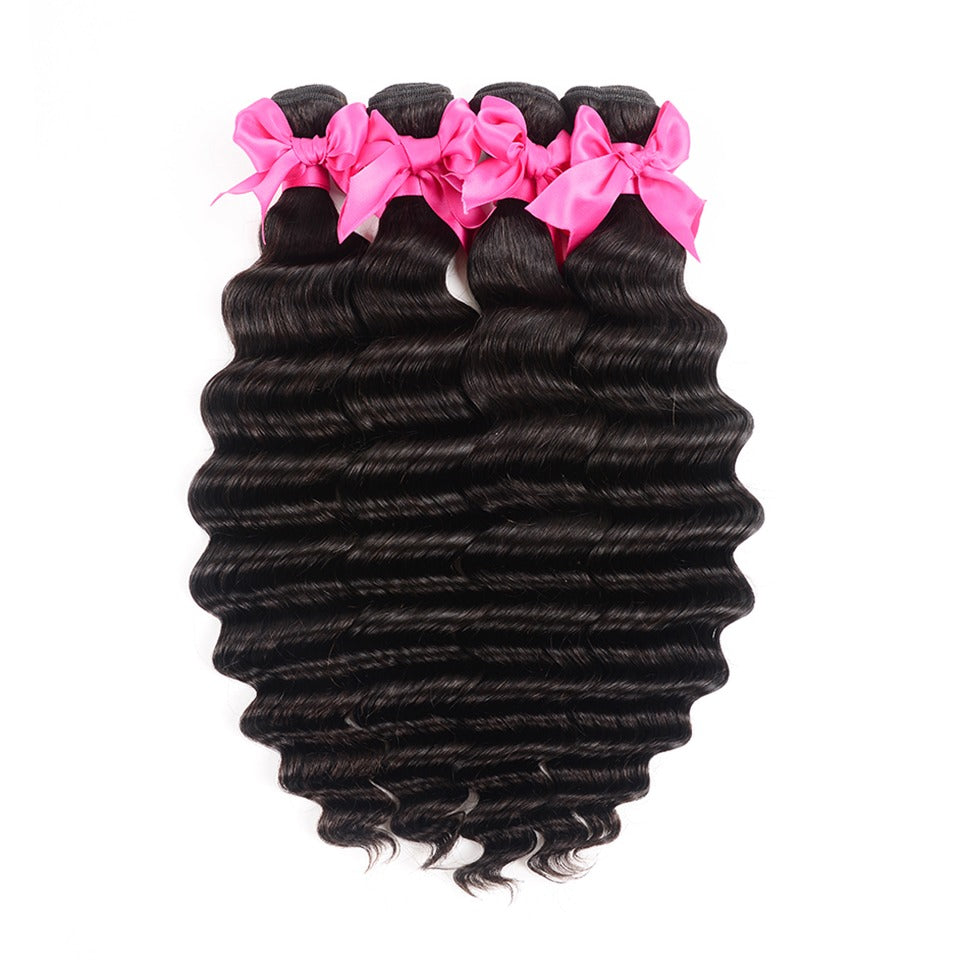 Wholesale Brazilian Loose Deep Wave hair bundles in various weights, showcasing the natural color and texture of 10A grade human hair.