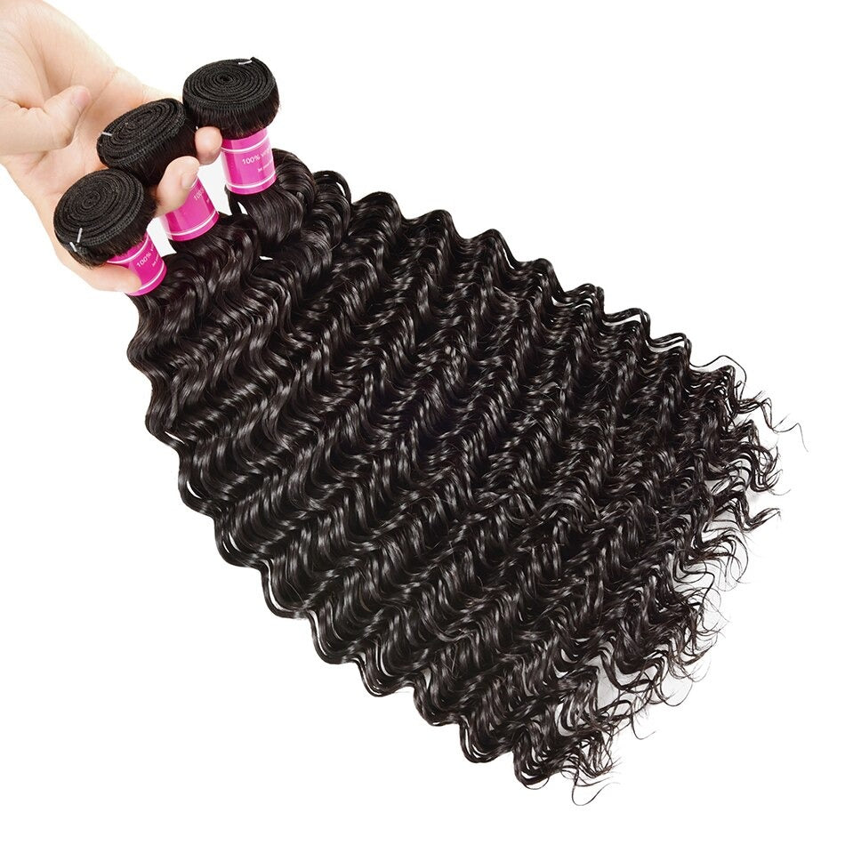 Five bundles of Wholesale Peruvian Deep Wave 10A Grade Human Hair in natural color, showcasing its bouncy texture and healthy ends.