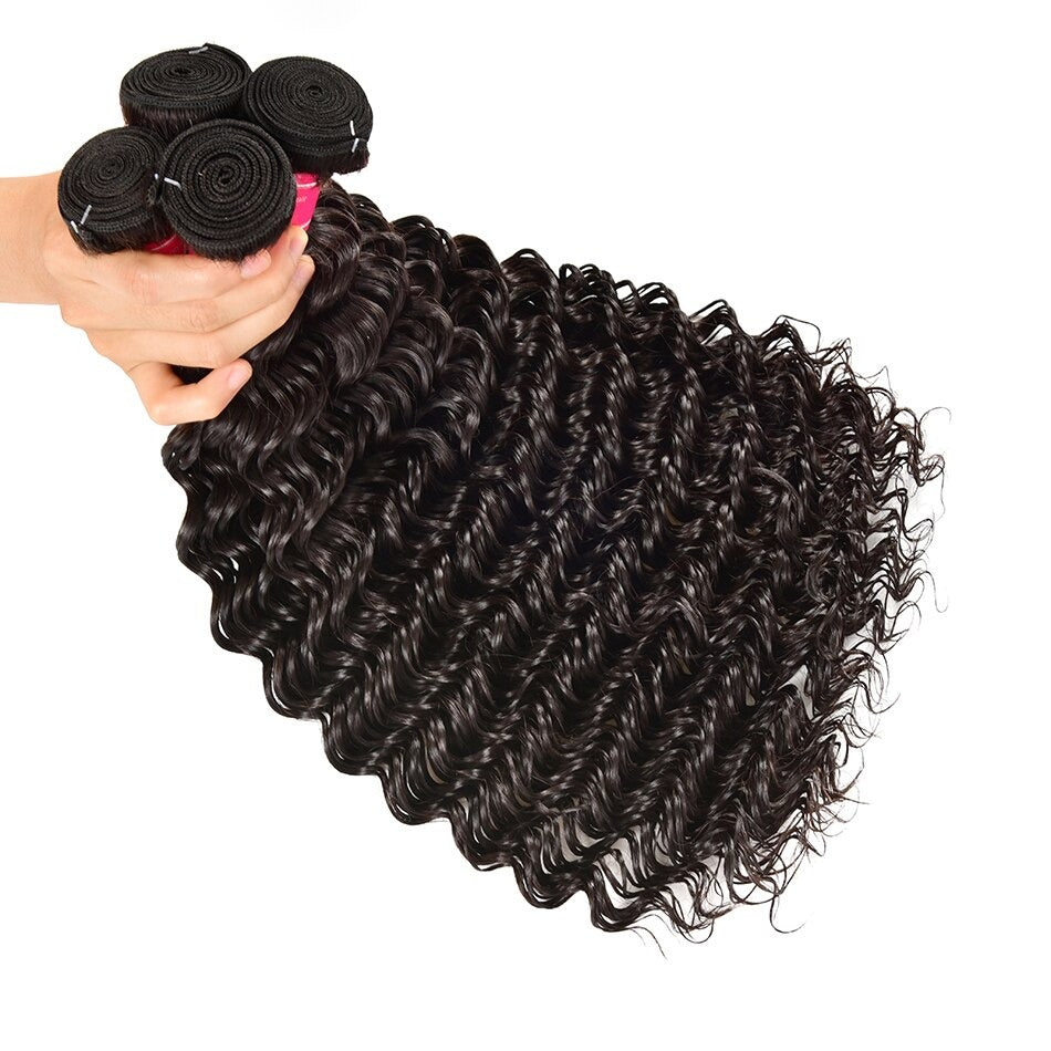 Five bundles of Wholesale Peruvian Deep Wave 10A Grade Human Hair in natural color, showcasing its bouncy texture and healthy ends.