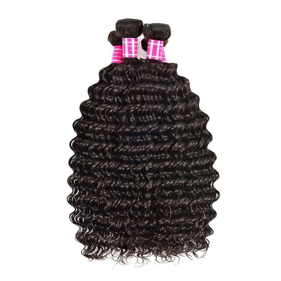 Five bundles of Wholesale Peruvian Deep Wave 10A Grade Human Hair in natural color, showcasing its bouncy texture and healthy ends.