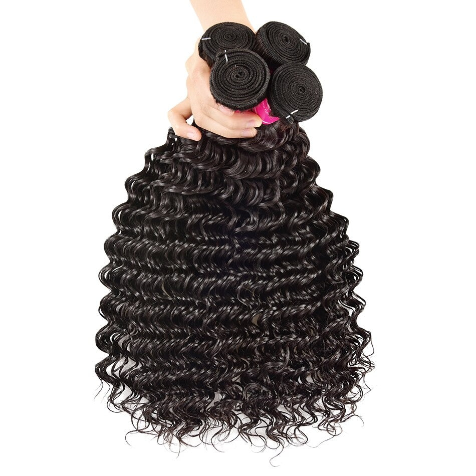 Five bundles of Wholesale Peruvian Deep Wave 10A Grade Human Hair in natural color, showcasing its bouncy texture and healthy ends.