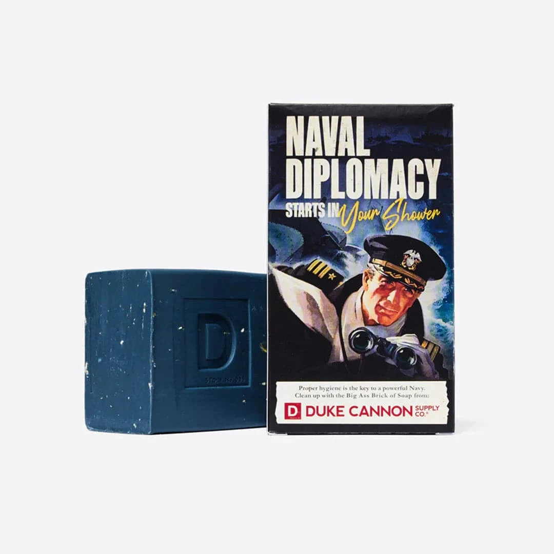 WWII-era Big Ass Brick of Soap in blue, featuring naval-themed packaging and steel cut grains for grip.