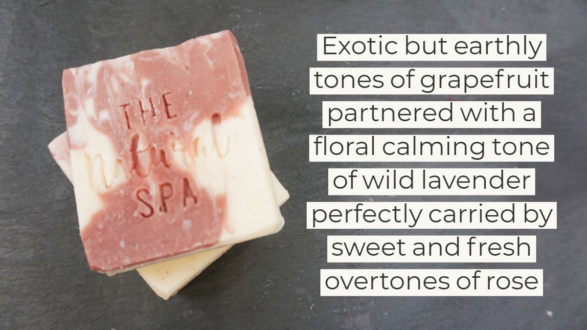 Wild Flower Wisp cold process soap bar featuring rose, lavender, and grapefruit scents, elegantly designed for a luxurious bathing experience.