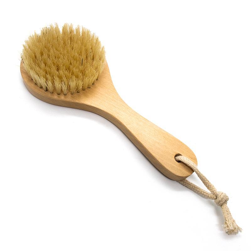 A wooden body brush made from natural Hemu wood with sisal cactus fibers, designed for exfoliating skin and promoting circulation.