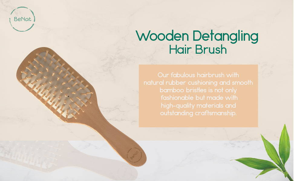 Wooden Detangling Hair Brush with bamboo bristles and natural rubber cushioning, designed for smooth and healthy hair.