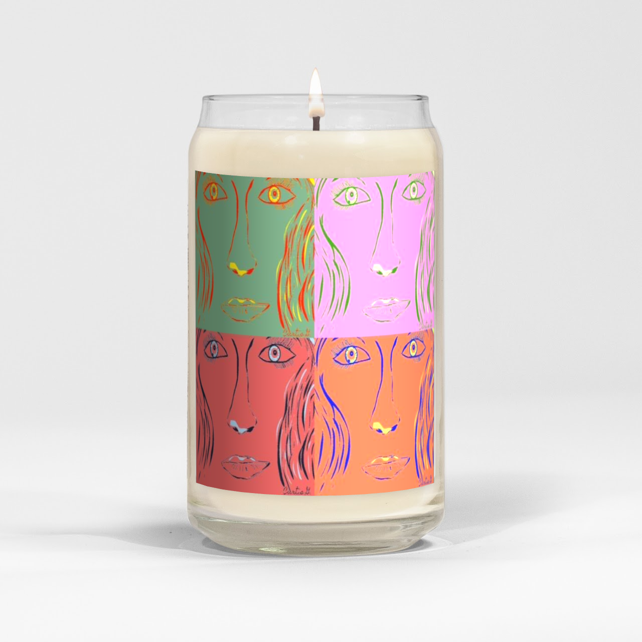 A beautifully crafted 'Woman Goes Pop!' candle in a clear vessel, showcasing its natural soy wax and vibrant scent options.