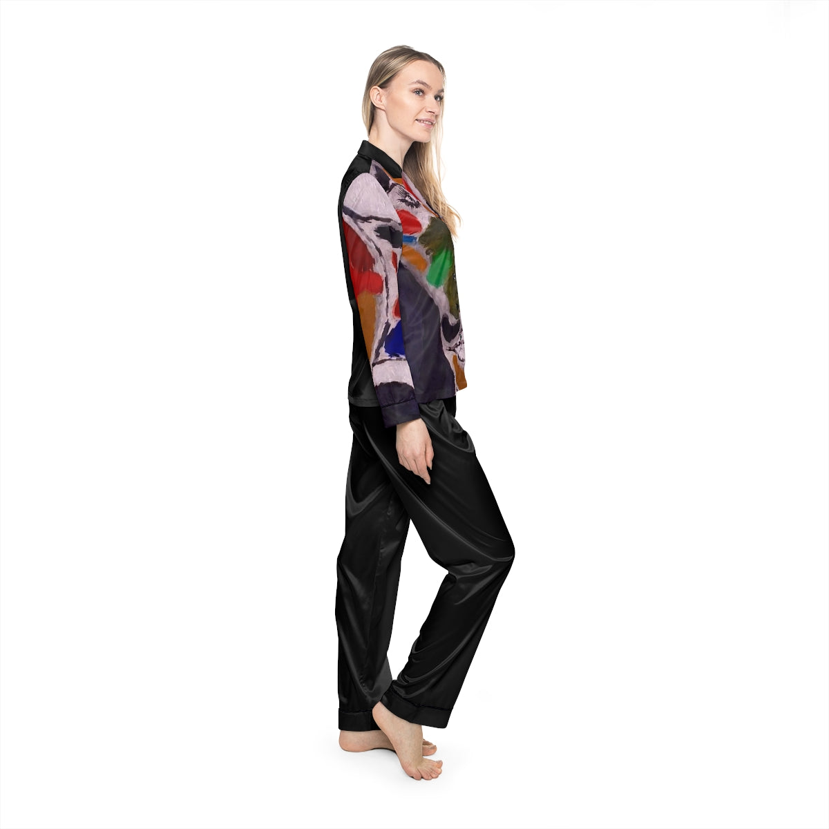 A pair of women's satin pajamas featuring a soft fabric blend, customizable design, notch lapel collar, and drawstring waist in a stylish setting.