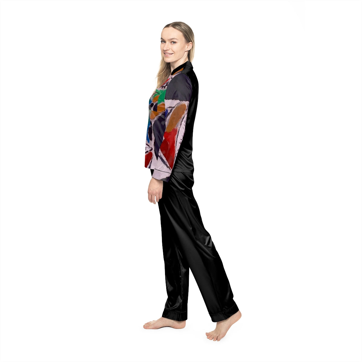 A pair of women's satin pajamas featuring a soft fabric blend, customizable design, notch lapel collar, and drawstring waist in a stylish setting.