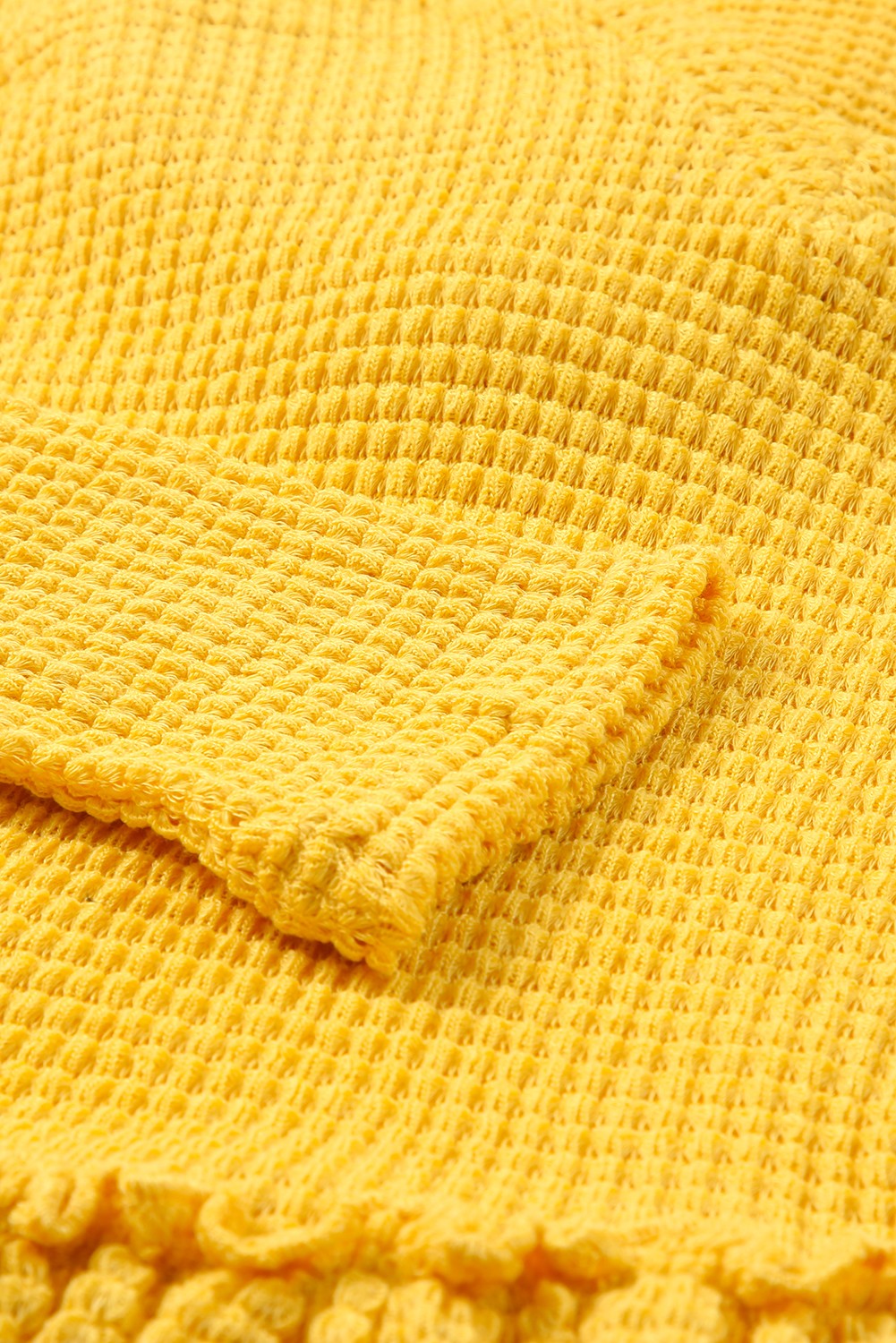 A stylish yellow V neck drop shoulder hooded top with frill detail, showcasing a relaxed fit and long sleeves, perfect for casual wear.