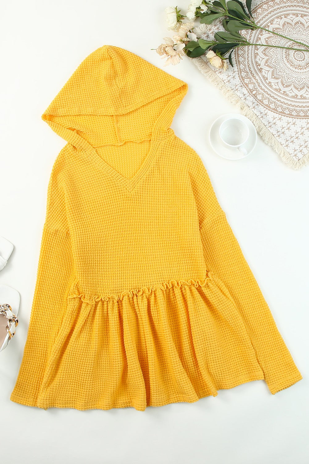 A stylish yellow V neck drop shoulder hooded top with frill detail, showcasing a relaxed fit and long sleeves, perfect for casual wear.