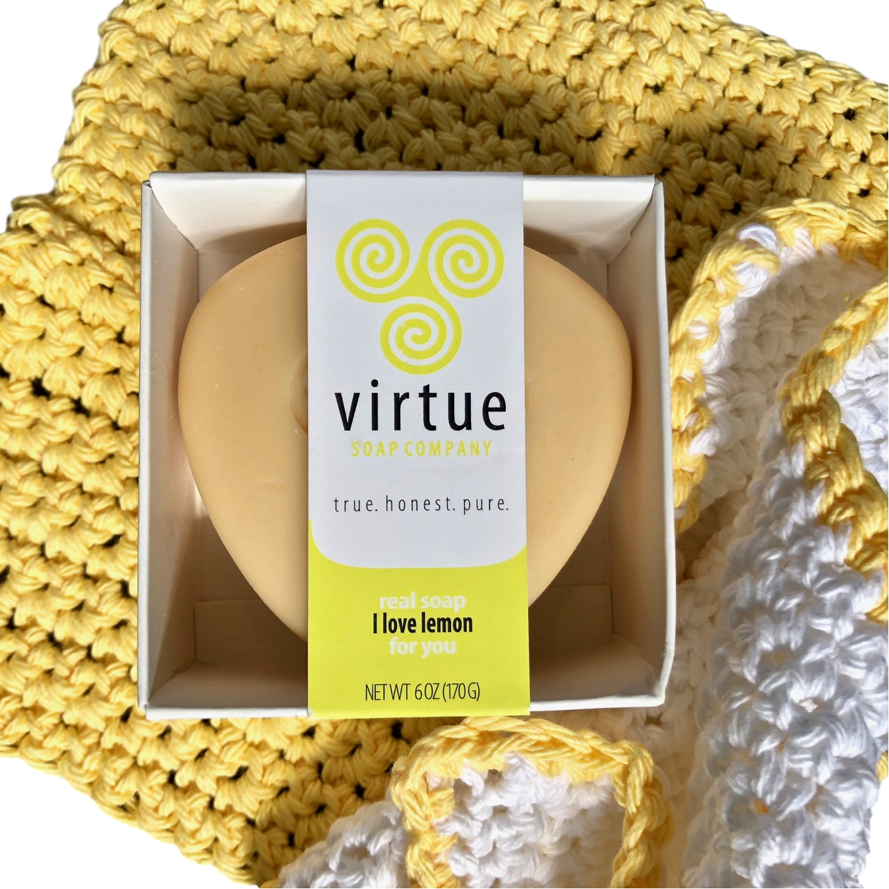 A 6oz bar of handcrafted lemon soap with a vibrant yellow color, showcasing its artisan quality and natural ingredients.