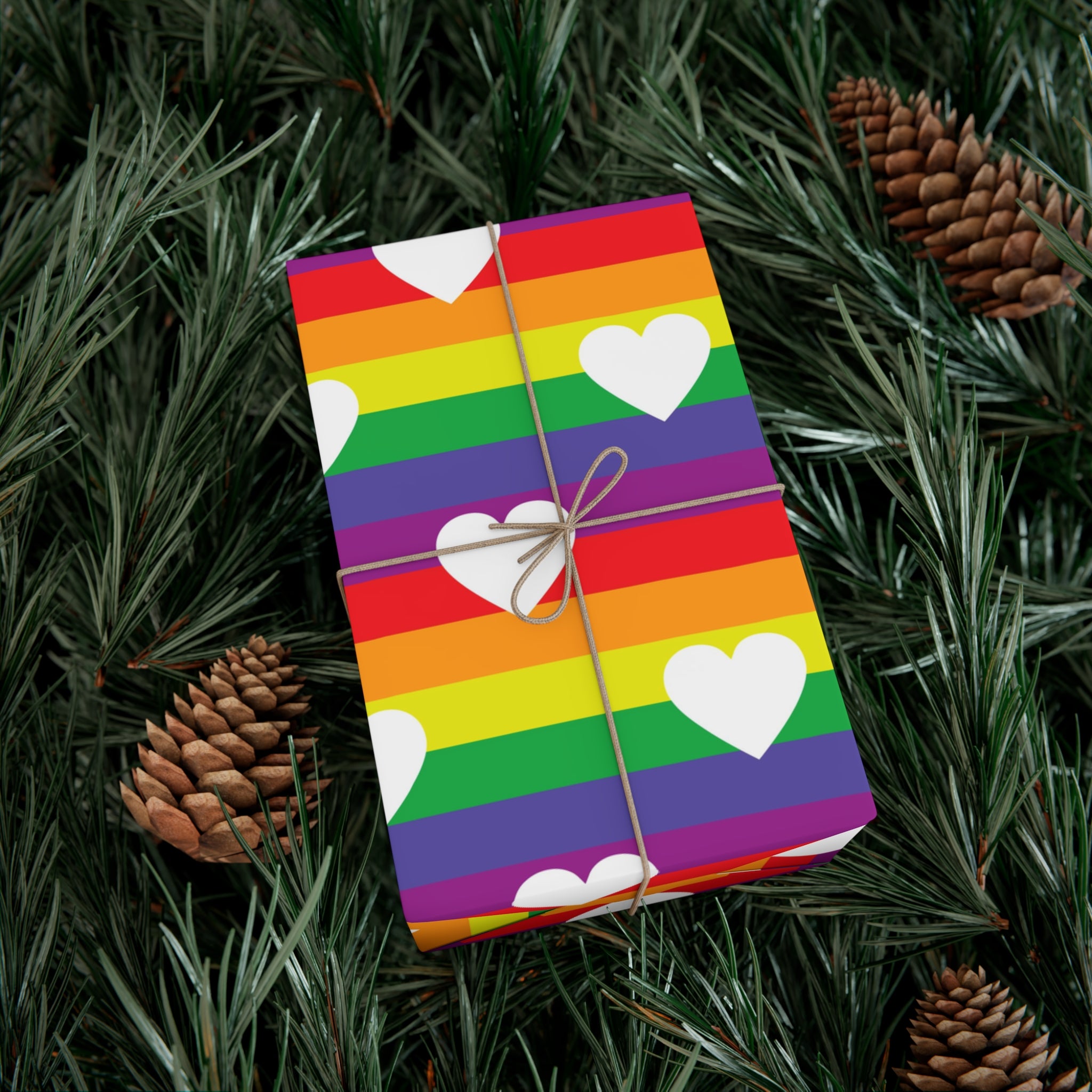 Vibrant Pride Wrapping Paper featuring rainbow and heart designs, available in matte and satin finishes.
