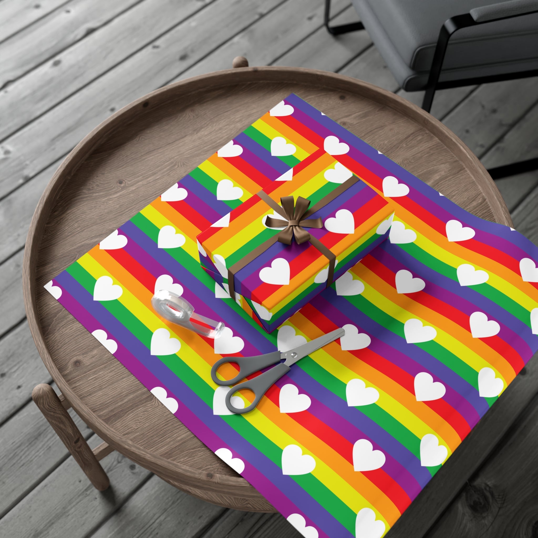 Vibrant Pride Wrapping Paper featuring rainbow and heart designs, available in matte and satin finishes.