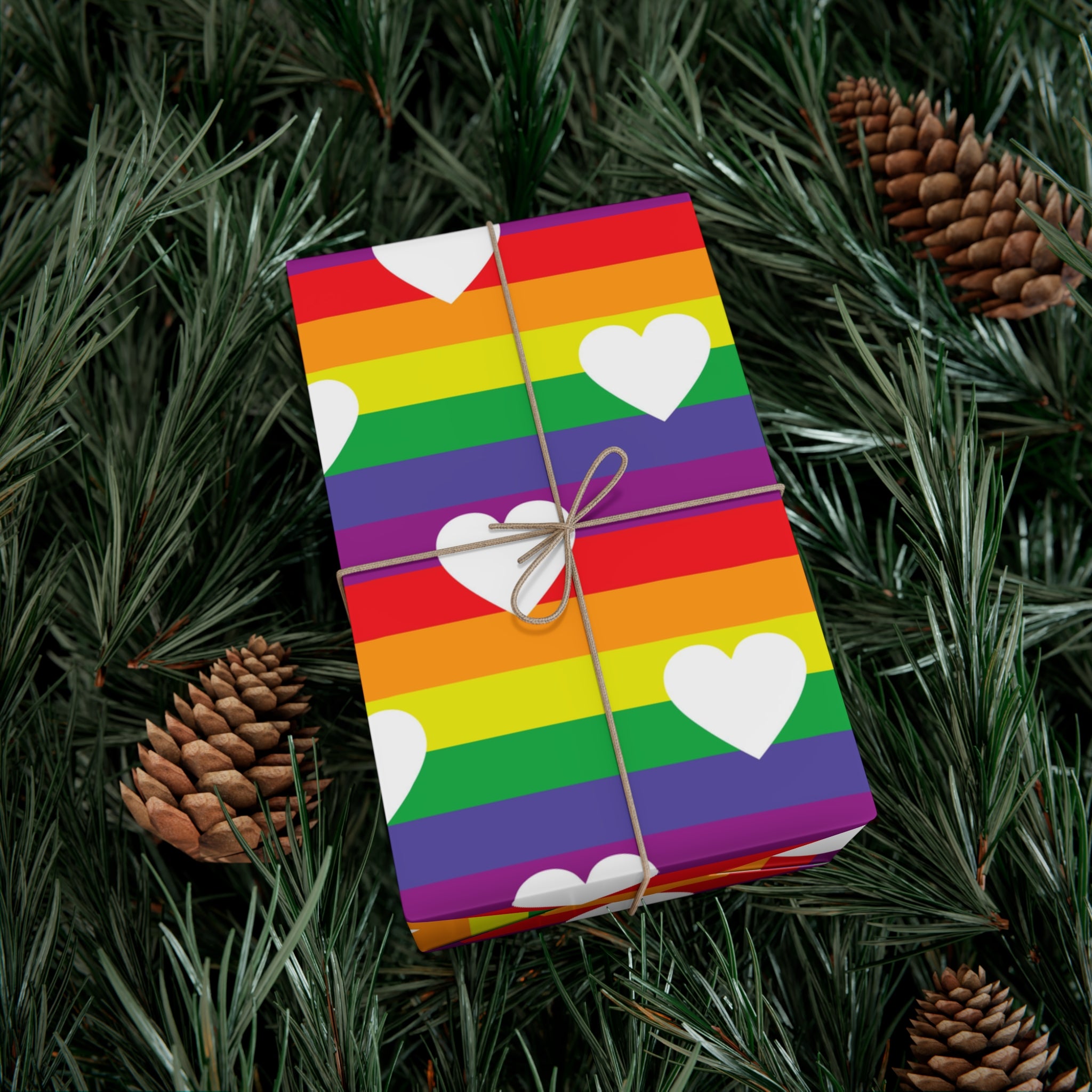 Vibrant Pride Wrapping Paper featuring rainbow and heart designs, available in matte and satin finishes.