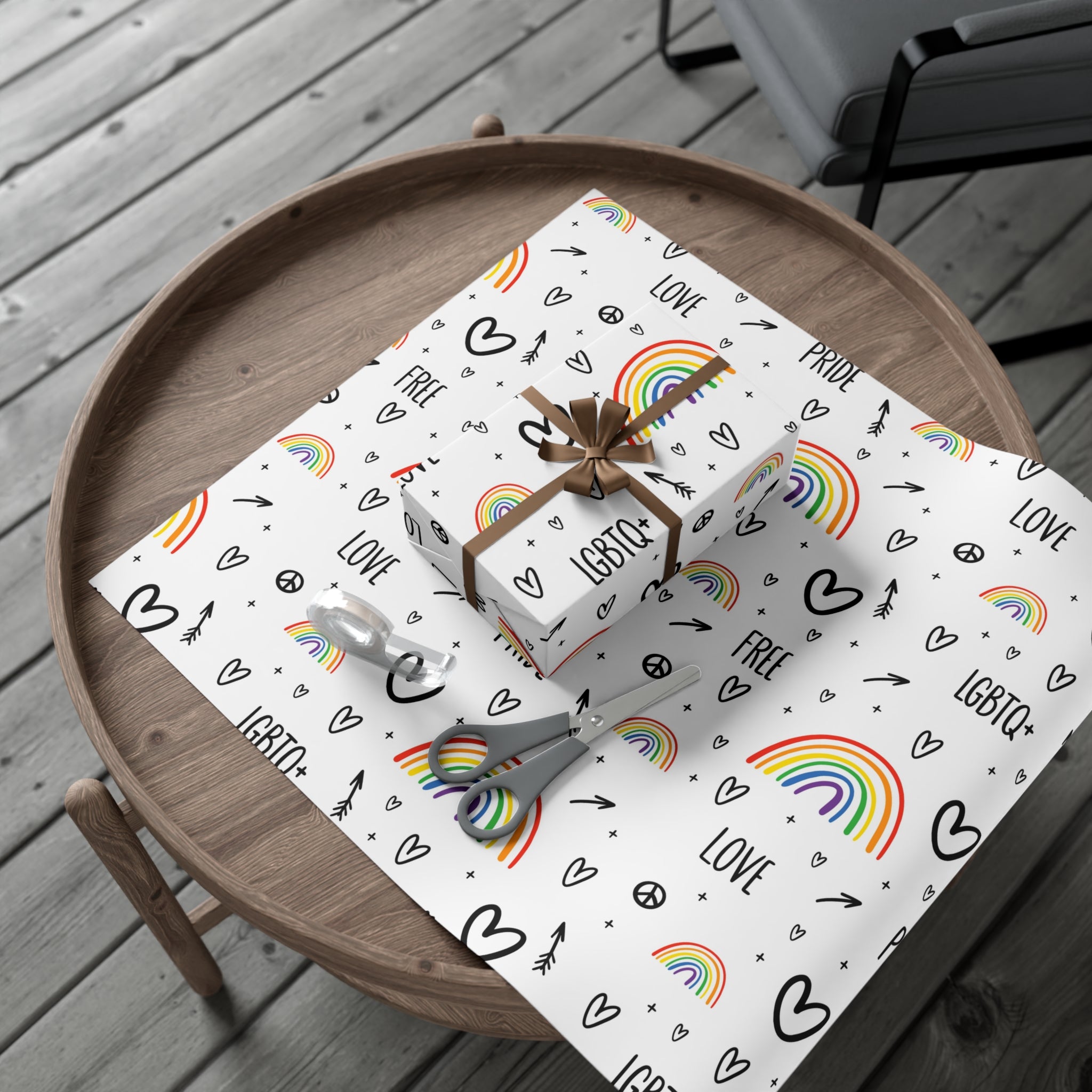 Vibrant Pride Wrapping Paper featuring rainbow and heart designs in satin and matte finishes.