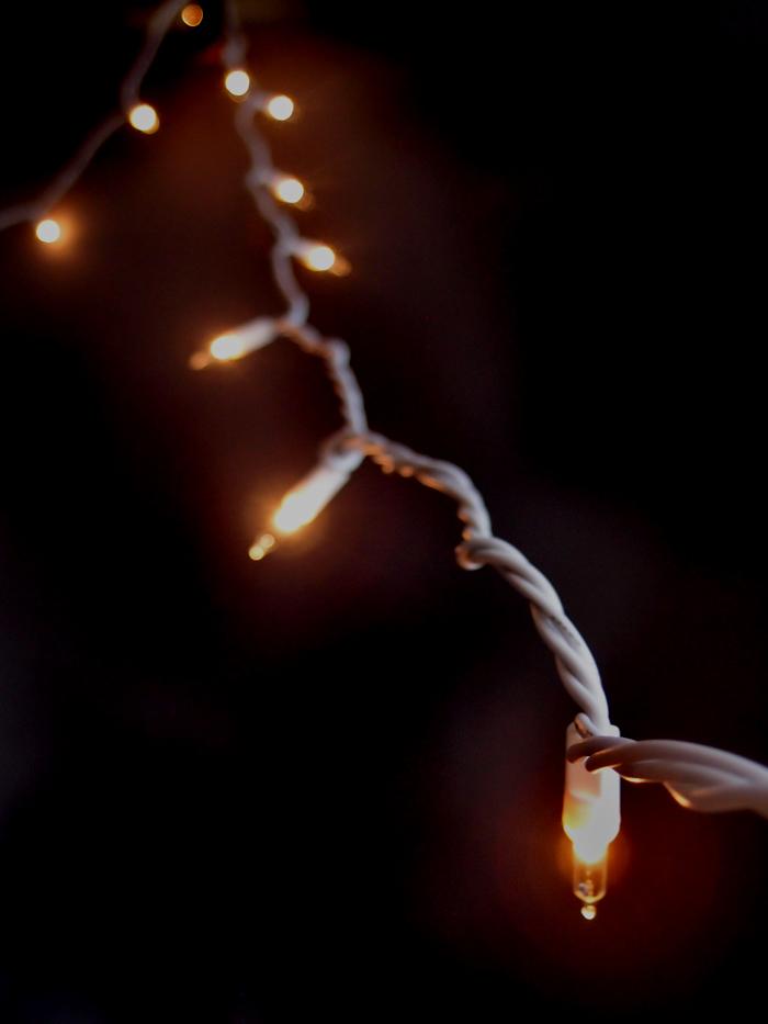 10 Indoor LED Mini String Lights with 8.35 FT white cord, featuring 10 mini clear bulbs for decorative lighting.