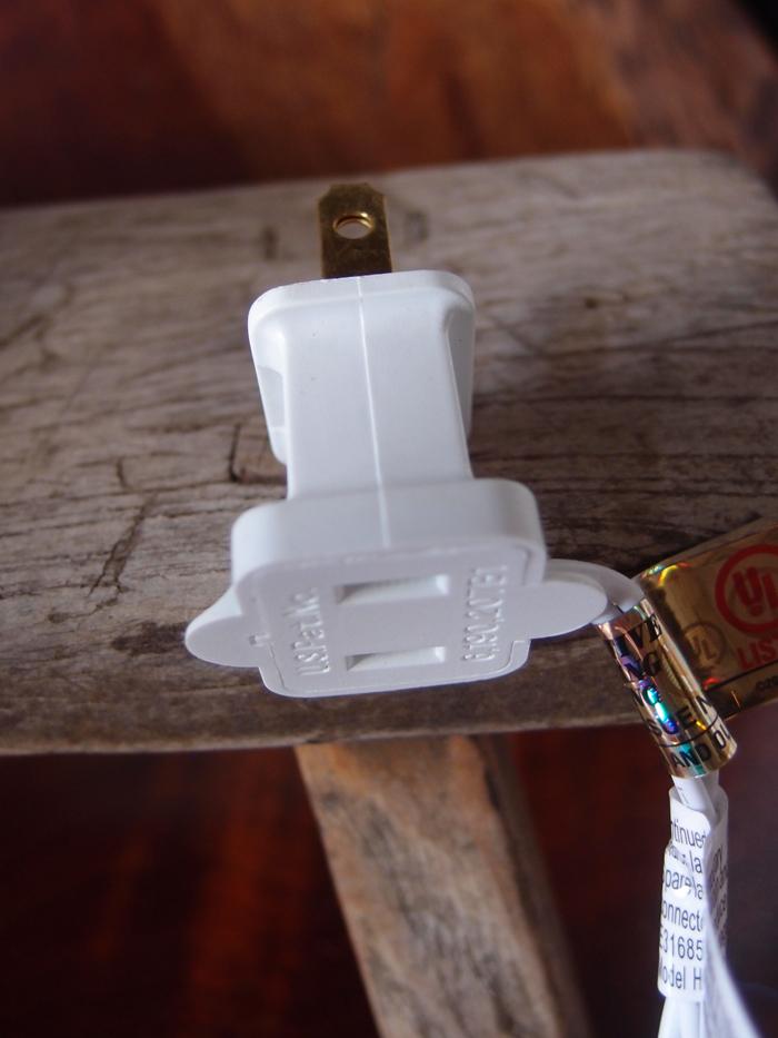 10 Indoor LED Mini String Lights with 8.35 FT white cord, featuring 10 mini clear bulbs for decorative lighting.