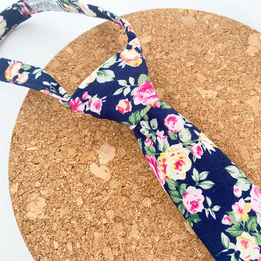 JAMESON Floral Boys Velcro Tie featuring pink and yellow roses on a navy background, perfect for young boys.