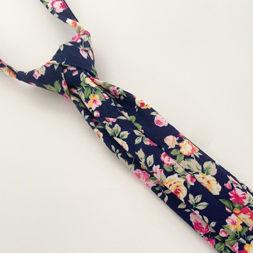 JAMESON Floral Boys Velcro Tie featuring pink and yellow roses on a navy background, perfect for young boys.