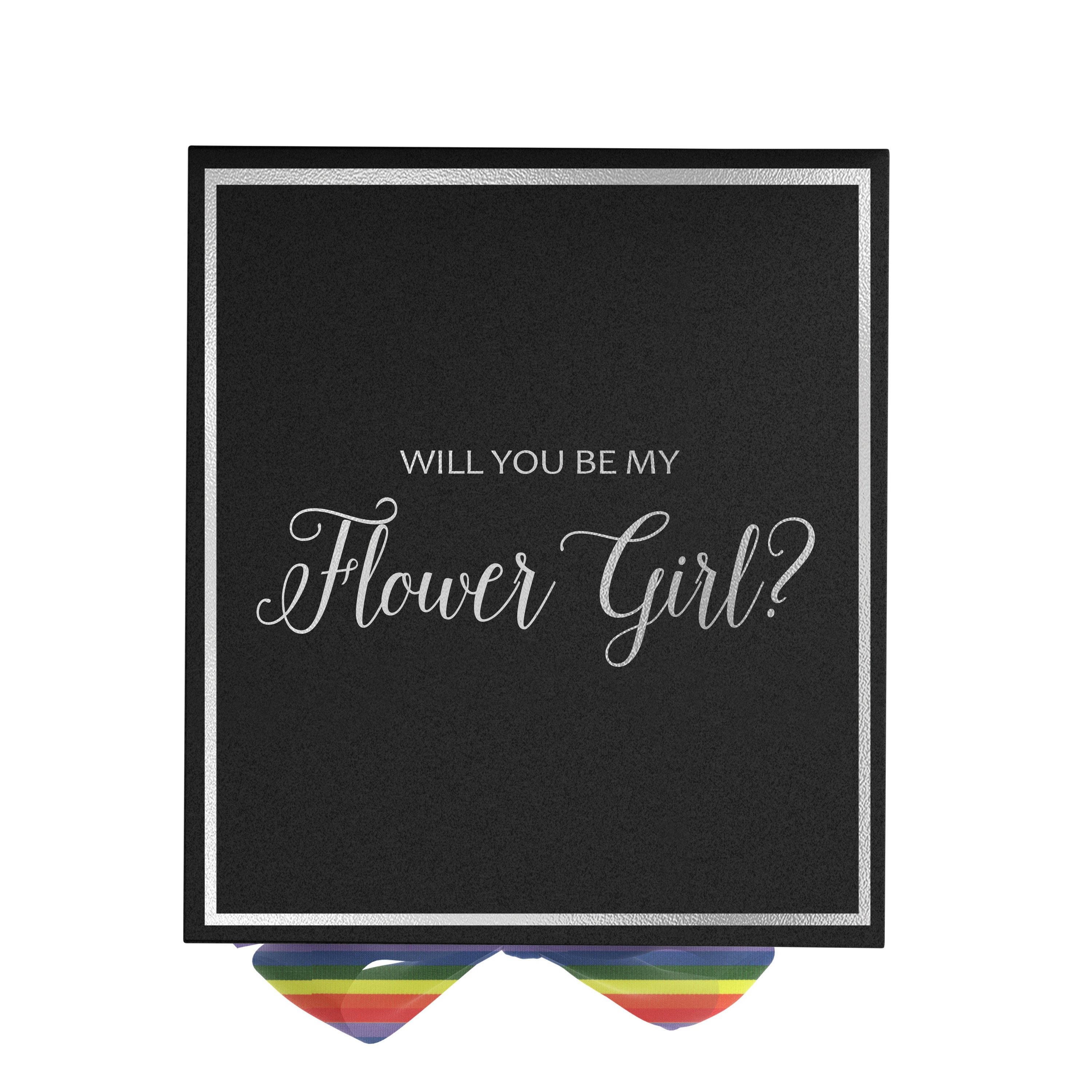 Elegant black proposal box with metallic writing and rainbow bow, perfect for flower girl proposals.